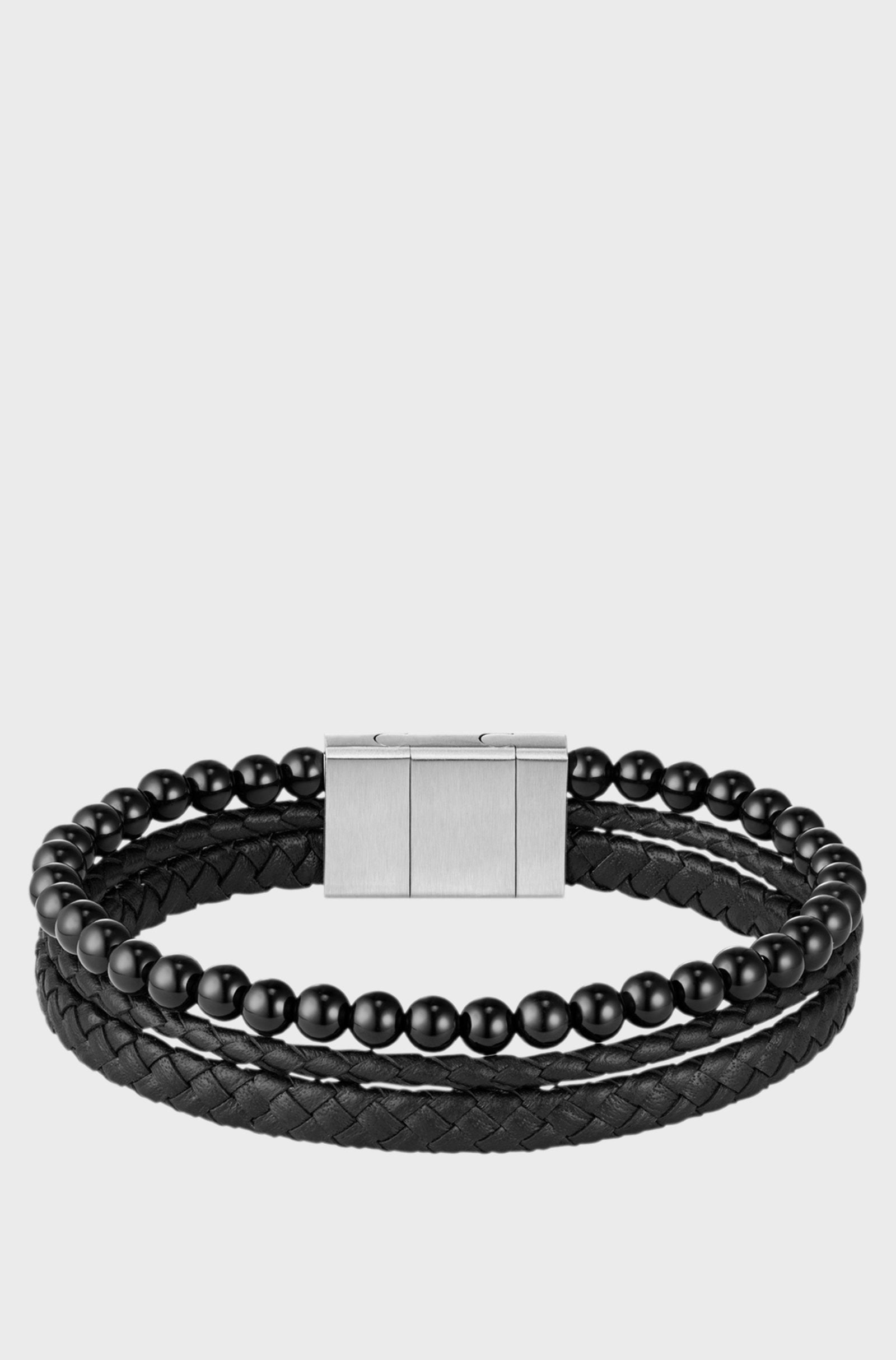 Boss bracelet with tiger beads and braided black leather.